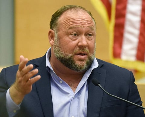 Infowars founder Alex Jones testifies at the Sandy Hook defamation damages trial at Connecticut Superior Court in Waterbury, Conn., on Thursday, Sept. 22, 2022.