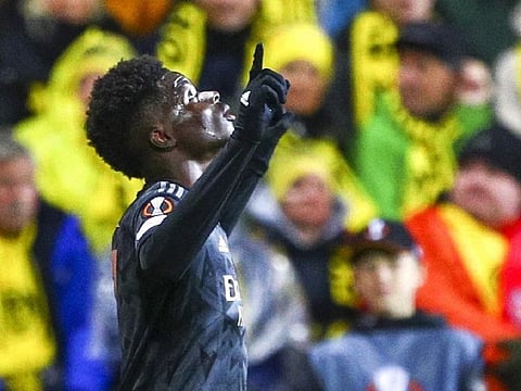 Arsenal's Bukayo Saka celebrates scoring a goal on Thursday.