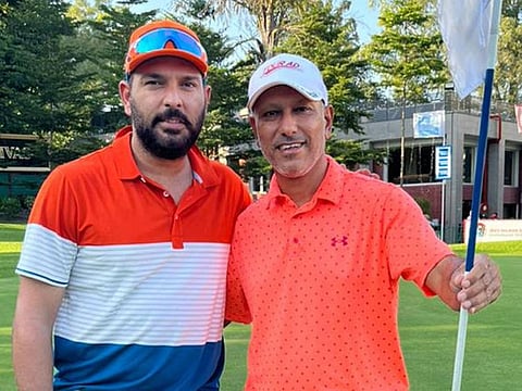 Jeev Milkha Singh (right), host of his tournament on the PGTI, played with Indian cricketer Yuvraj Singh in the Pro-Am on Wednesday.