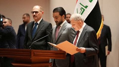 Abdul Latif Rashid takes his oath of office in front of Iraqi lawmakers in Baghdad.