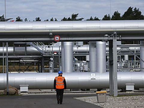 A security man walks in front of the landfall facility of the Baltic Sea gas pipeline Nord Stream 2 in Lubmin, Germany.