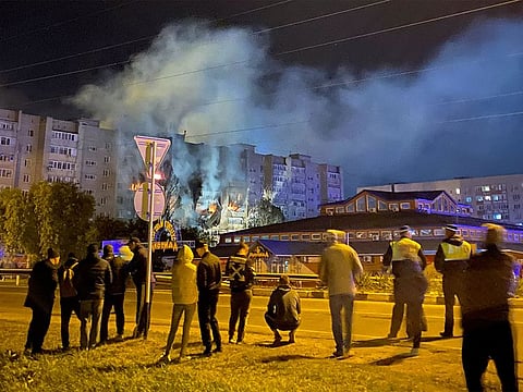 The site of a plane crash on residential building in the southern city of Yeysk, Russia.