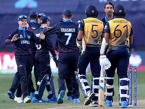 Namibia's and Sri Lanka's players shake hands after their T20 World Cup Cricket match in Geelong, Australia. Namibia will take on Netherlands next.