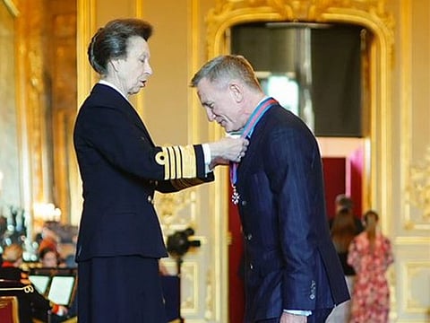 The Princess Royal presents Daniel Craig with The Order of St Michael and St George