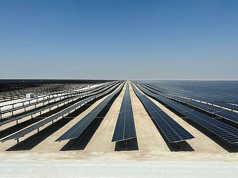 Solar panels are seen at the Al Kharsaah solar plant project in Qatar.