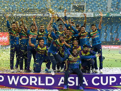 Sri Lankan team pose with the trophy after winning the DP World Asia Cup 2022, defeating Pakistan in the final in Dubai. Trouble brewing on the 2023 edition after India said they would not travel to Pakistan.