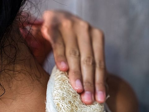 The body exfoliation conundrum - we ask several experts if the loofah belongs in the shower or the bin