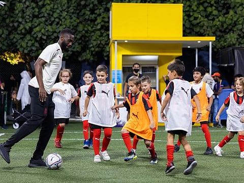 AC Milan player Fikayo Tomori hosts a football training session for children at the Sports, Fitness and Wellbeing Hub, Expo 2020 Dubai, in March