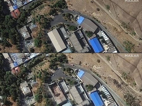 This combination of handout satellite images released by Maxar Technologies on October 17, 2022 shows the before (top) and after (bottom), of one of the buildings in Iran's Evin prison complex in Tehran, that was heavily damaged by a fire.