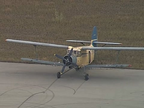 The pilot arrived aboard a Russian Antonov AN-2 single-engine plane at Dade-Collier Airport, located in the Everglades, officials said.