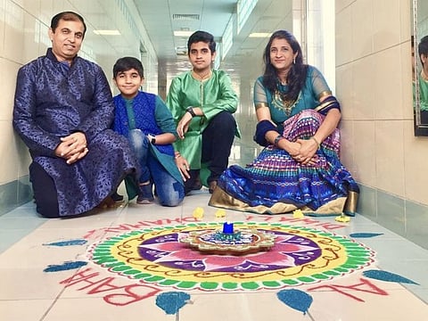 For Avinash Bhatia’s (left) family, Diwali is extra special because of his wife Manisha’s skills in making rangolis