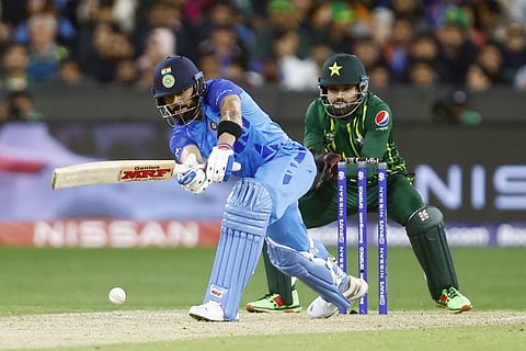India's Virat Kohli plays a shot during the ICC Men's T20 World Cup 2022 Super 12 Group 2 match between India and Pakistan, at Melbourne Cricket Ground, in Melbourne.