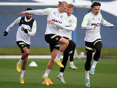 Manchester City's midfielder Riyad Mahrez (left), striker Erling Haaland (second left), midfielder Kevin De Bruyne (second right) and midfielder Jack Grealish attend a team training session at Manchester City training ground in Manchester on the eve of their UEFA Champions League Group G match against Borussia Dortmund.