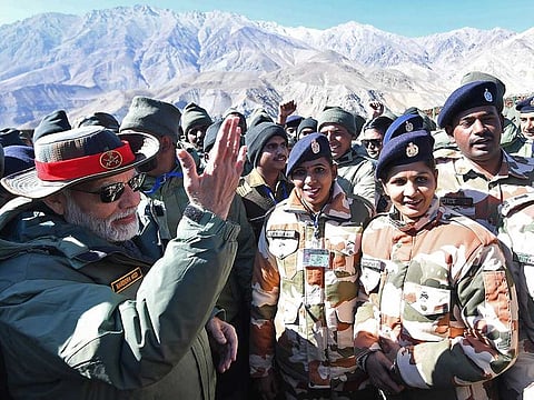 India's Prime Minister Narendra Modi attending the celebrations with the members of Indian Armed Forces on the occasion of Diwali, the Hindu festival of lights, at Kargil.