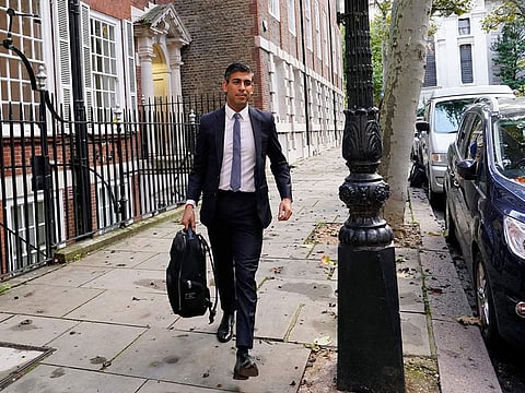 Conservative Party leadership candidate Rishi Sunak leaves the campaign office in London, Monday, Oct. 24, 2022. Former British Treasury chief Rishi Sunak is frontrunner in the Conservative Party's race to replace Liz Truss as prime minister.