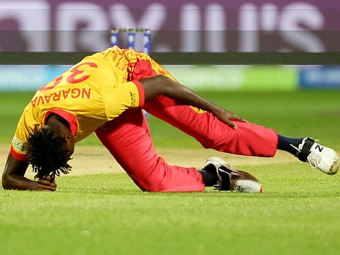 Zimbabwe’s Richard Ngarava slips and injures his leg during the ICC Men’s T20 World Cup 2022 Super 12 Group 2 match against South Africa and Zimbabwe at the Bellerive Oval in Hobart on October 24, 2022.
