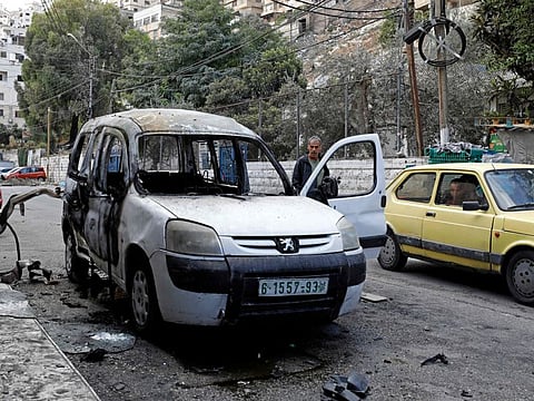 A damaged car during an overnight Israeli raid in Nablus, in the West Bank on October 25, 2022.