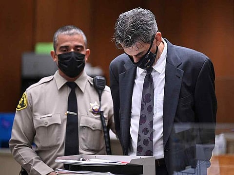 Hollywood producer Eric Weinberg is taken into custody at his arraignment in Superior Court on on Tuesday, October 25, 2022, in Los Angeles.