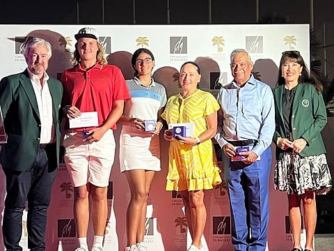 Winners of the BMW Championship and the Luckiest Ball on Earth Qualifiers with EGC Captain's Campbell Steedman (left) and Maria Arias (right)