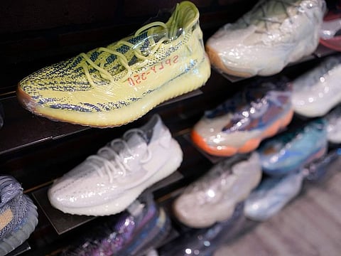 Yeezy shoes made by Adidas are displayed at Kickclusive, a sneaker resale store, in Paramus, N.J., Tuesday, Oct. 25, 2022.