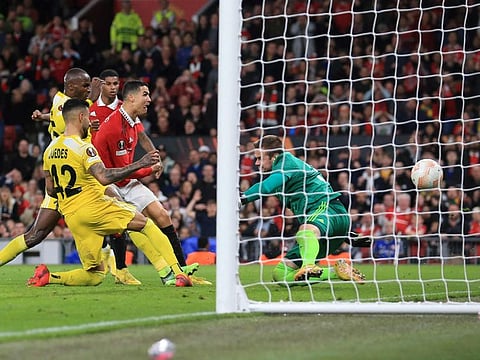 Manchester United's Cristiano Ronaldo scores the team's third goal during the UEFA Europa League Group E match against Sheriff Tiraspol at Old Trafford on Thursday.
