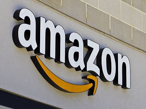 Amazon said it would take a "minority ownership position" in the AI firm.