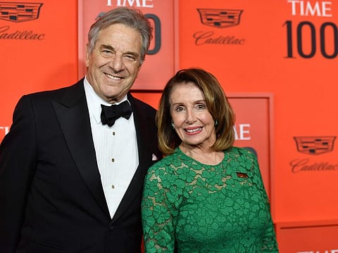 In this file photo taken on April 23, 2019, US Speaker of the House of Representatives Nancy Pelosi and husband Paul Pelosi arrive for the Time 100 Gala at Lincoln Center in New York.