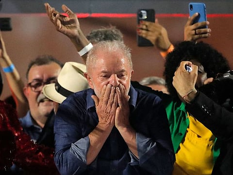 Luiz Inacio Lula da Silva, has been elected the next president of Brazil, in a stunning comeback following a tight run-off race. Here he gestures to his supporters following the final results on Sunday