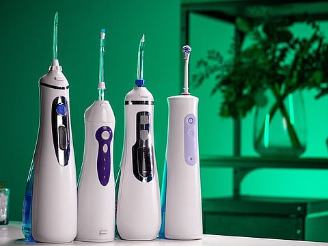 Our expert says that a water flosser can rid your teeth of staining as well as plaque buildup. Find the best cordless or corded model for home and travel below.