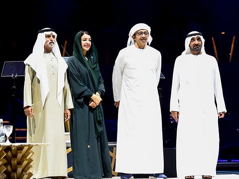 Sheikh Abdullah bin Zayed Al Nahyan with Sheikh Nahayan bin Mubarak Al Nahayan, Sheikh Ahmed bin Saeed Al Maktoum and Reem Al Hashimi at the World Cities Day event at Al Wasl Plaza in Dubai on Monday.