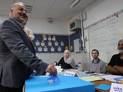 Mansour Abbas, head of Israel's conservative Islamic Raam party, casts his ballot at a polling station in the northern Israeli village of Maghar on November 1, 2022. Israelis began voting in their fifth election in less than four years, with veteran leader Benjamin Netanyahu campaigning for a comeback alongside far-right allies.