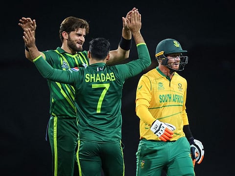 South Africa’s Heinrich Klaasen leaves after being dismissed by Pakistan’s Shaheen Shah Afridi (left) during the 2022 ICC Twenty20 World Cup cricket match in Sydney, Australia, on November 3, 2022.