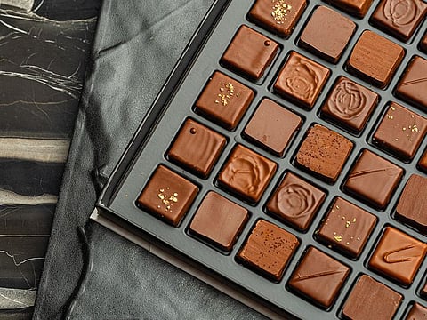 Useful tools like moulds and dipping utensils can help you get consistent, uniform results when making chocolate treats at home.