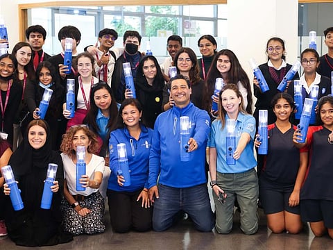 Students of GEMS Wellington Academy–Silicon Oasis in Dubai with the solar lights