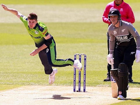 Ireland's Josh Little bowls against New Zealand in the Twenty20 World Cup at Adelaide. The left-arm pacer gave himself a belated birthday present with a hat-trick.