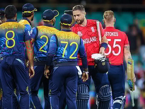 England’s Ben Stokes (right) walks off as teammate Chris Woakes shakes hands with players from Sri Lanka after winning the ICC men's Twenty20 World Cup 2022 cricket match at the Sydney Cricket Ground (SCG).
