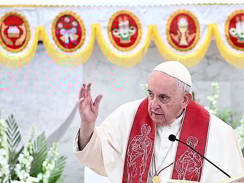 Pope Francis addresses the attendees at the Sacred Heart church in the Bahraini capital Manama.