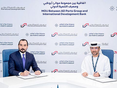 Captain Mohamed Juma Al Shamisi, Managing Director and Group CEO of AD Ports Group (right), and Ziad Khalaf, Chairman, International Development Bank, sign the agreement.