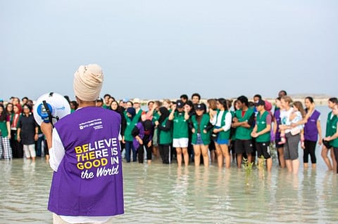 NYUAD community members work towards a cause by planting 5,000 mangrove trees off Jebel Ali.