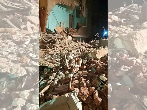 Search and rescue workers were looking through the rubble for survivors after a five-story residential structure came down in the densely populated area of Imbaba.