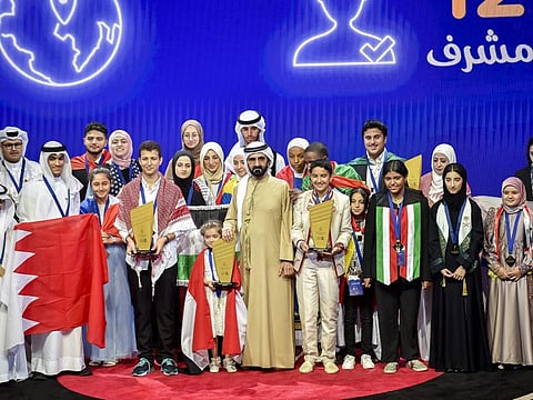 Sheikh Mohammed bin Rashid Al Maktoum, Vice President, Prime Minister, and Ruler of Dubai, with finalists and winners of Arab Reading Challenge 2022, at Dubai Opera, Dubai.
