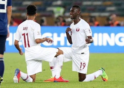 Qatar's Almoez Ali with Akram Afif.