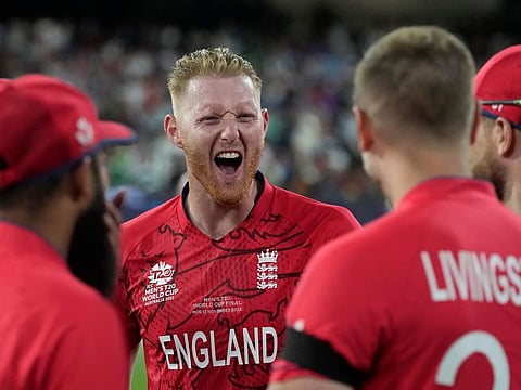 England’s Ben Stokes celebrates with teammates after beating Pakistan in the final to win the T20 cricket World Cup at the Melbourne Cricket Ground in Australia on November 13, 2022.