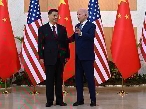 US President Joe Biden (right) and Chinese President Xi Jinping hold a meeting on the sidelines of the G20 Summit in Nusa Dua on the Indonesian resort island of Bali, on November 14, 2022.