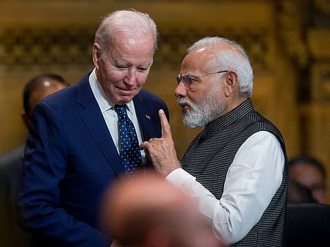 US President Joe Biden, left, talks with India's Prime Minister Narendra Modi during the G20 Summit in Nusa Dua, Bali, Indonesia, Tuesday Nov. 15, 2022.