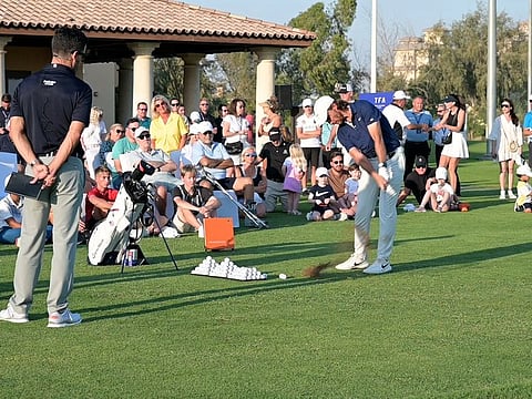 Tommy Fleetwood giving a clinic at the new academy at Jumeirah Golf Estates