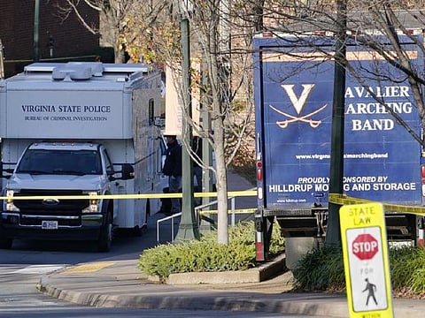 A Virginia State Police crime scene investigation truck is on the scene of an overnight shooting at the University of Virginia, Monday, Nov. 14, 2022, in Charlottesville, Virginia.