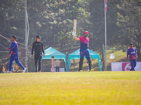 UAE opener Muhammad Waseem celebrates after crossing his half-century against Nepal on Wednesday.