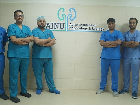 Doctors at Hyderabad hospital who removed a football-sized kidney tumour.