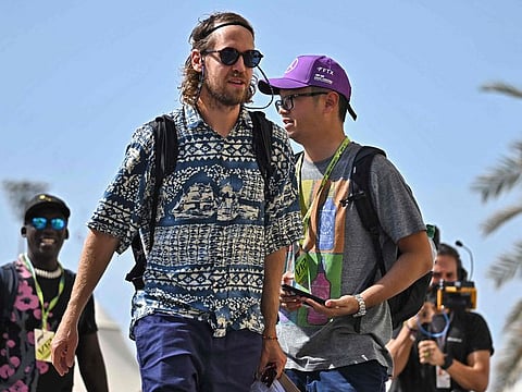 Aston Martin’s German driver Sebastian Vettel arrives for the first practice session ahead of the Abu Dhabi Formula One Grand Prix at the Yas Marina Circuit on November 18, 2022.